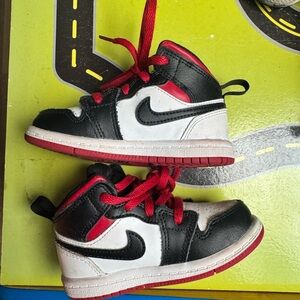 Nike Kids Black, White, and Red Sneakers